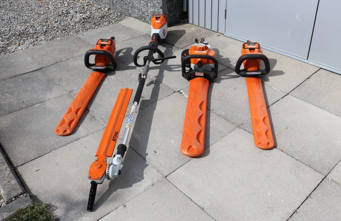 Motorsägen und Heckenschere